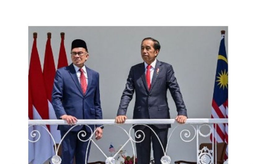 首相安华与印尼总统佐科威在总统俯相见。