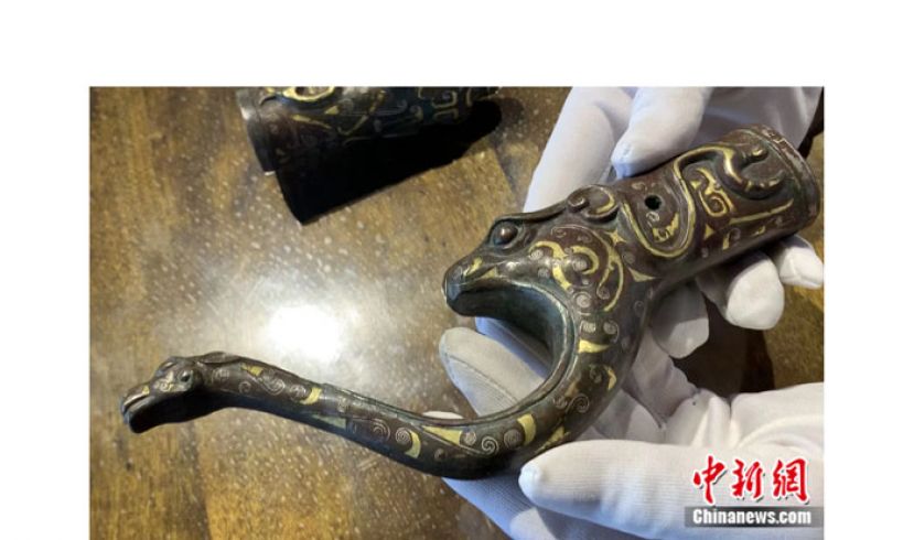 战国时期射箭活动时使用的承弓器。