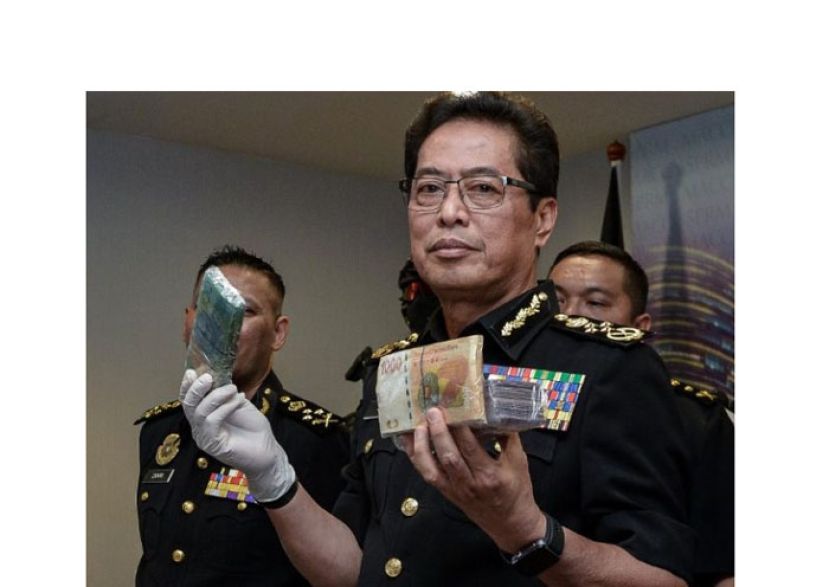 丹斯里阿占巴基。