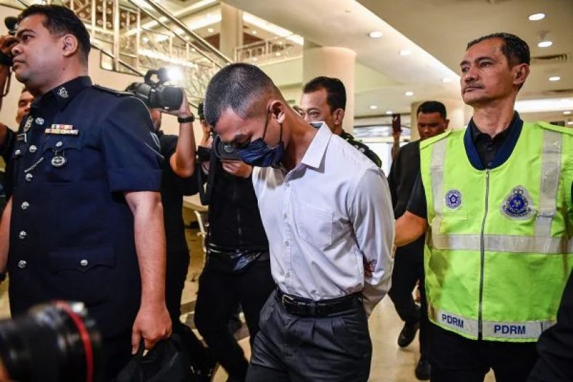 国防大学军事学员 以熨斗烫伤学弟胸部  但他否认有罪