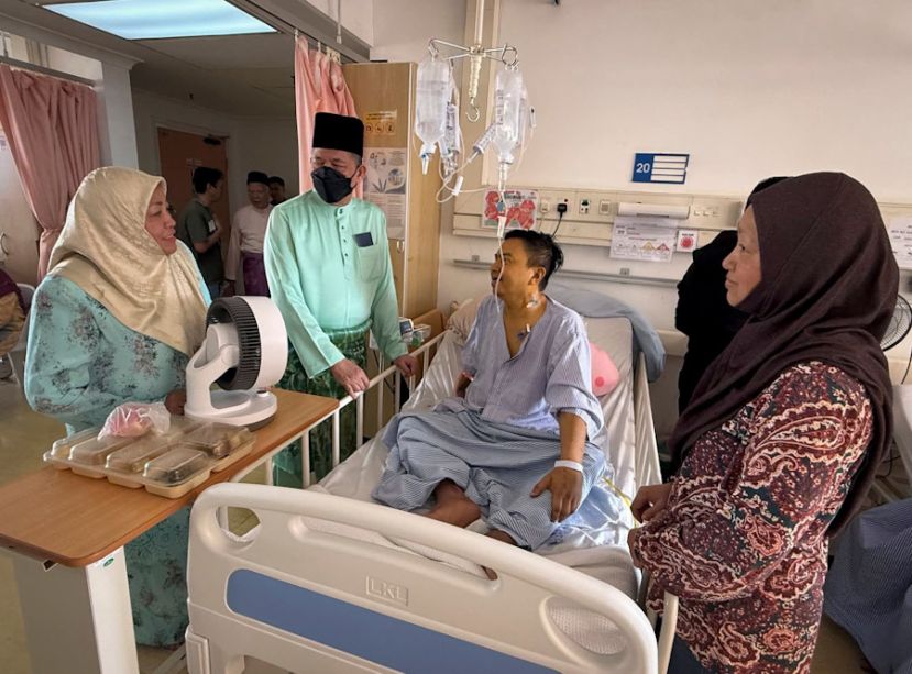 副首相法迪拉探访马新社摄影记者　鼓励媒体从业员重视健康