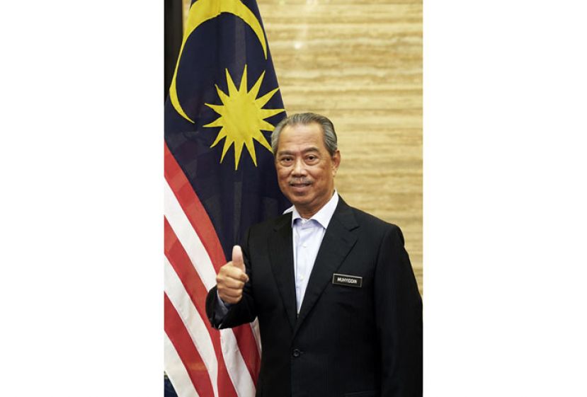 首相丹斯里慕尤丁。