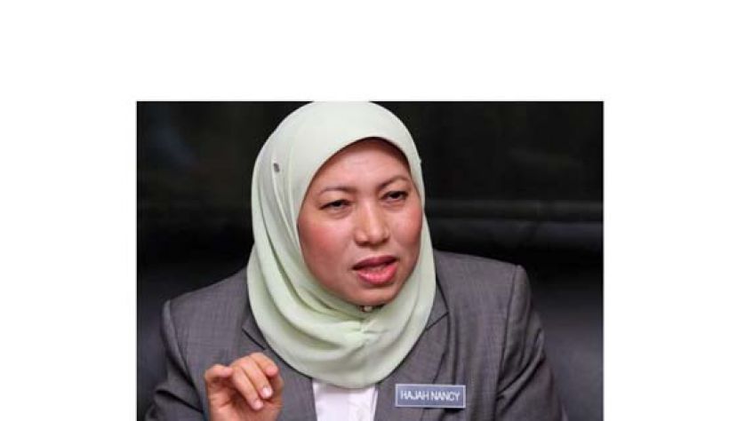 拿督斯里南希苏克里。 