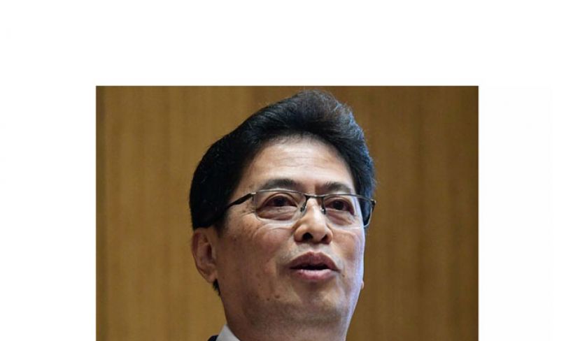 丹斯里阿占巴基。