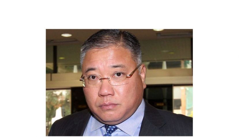 拿督斯里张庆信。