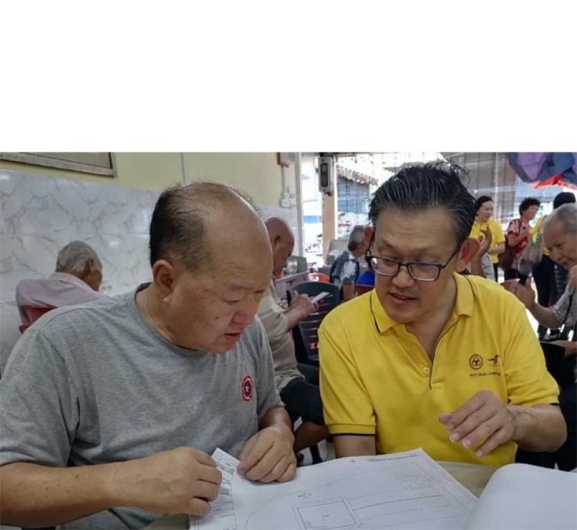 砂同心善堂主席黄国远与北市行政委员薛华东交流。