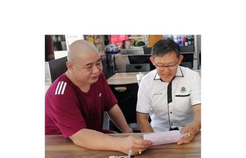 薛华东（右）及吴豪忠冀民众提防诈骗集团利用链接盗提银行户头存款。