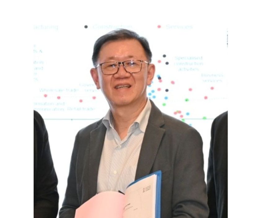 中总社会经济研究中心执行董事李兴裕。