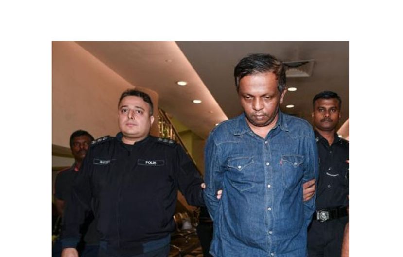 罗里司机被押离法庭时摄。