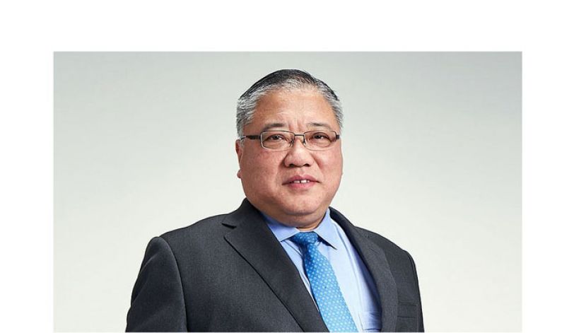 拿督斯里张庆信。