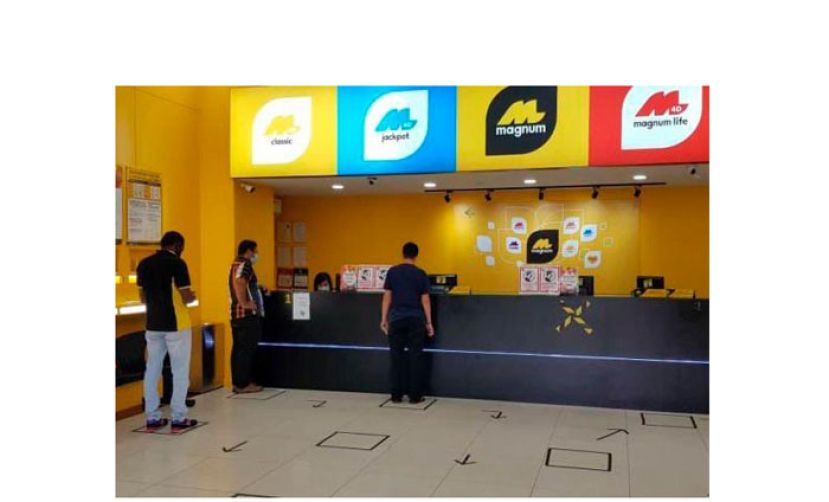 赢938万令吉万能积宝首奖　砂罗厘司机一夜致富