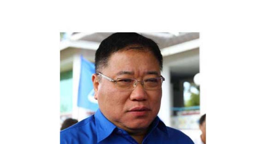 拿督斯里张庆信。