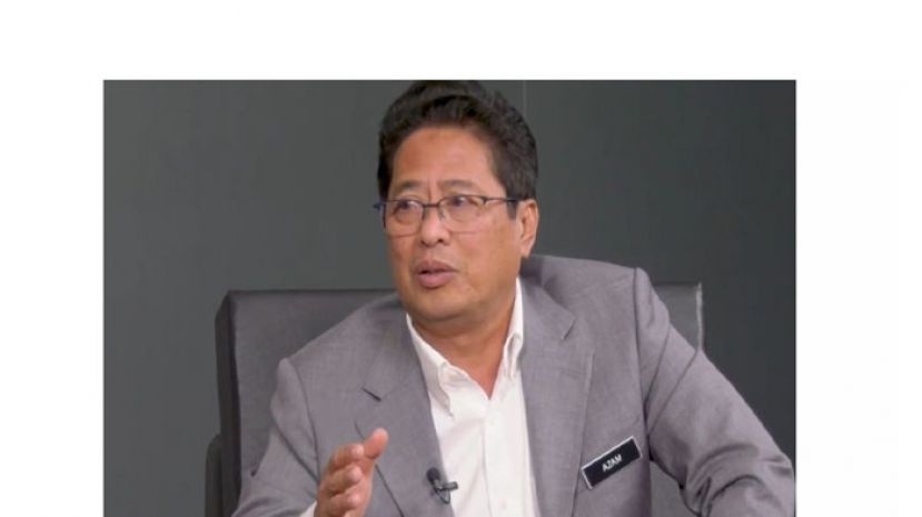 丹斯里阿占巴基。
