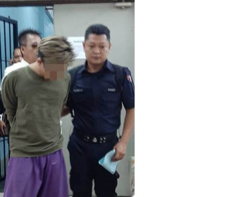  杨国斯路命案嫌犯被押上法庭过堂。