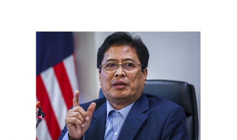 丹斯里阿占巴基。