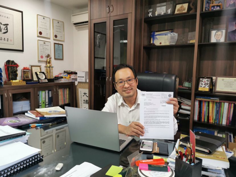 砂民主行动党主席张健仁。