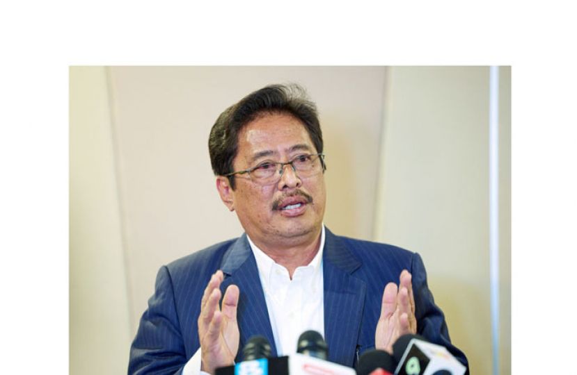 丹斯里阿占巴基。