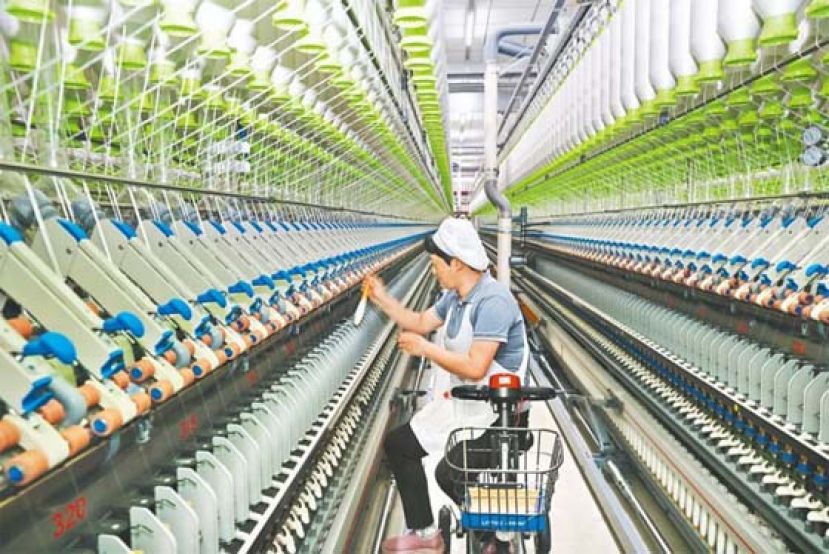 联合国将中国经济成长率上调至5.3％。