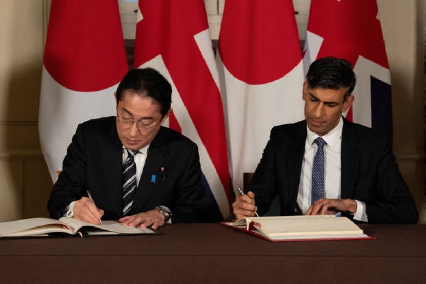 日本首相岸田文雄（左）、英国首相苏纳克（右）。
