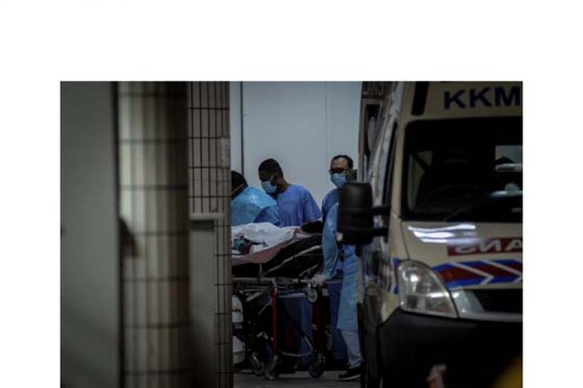 枪击事件中受伤的诺利汉送入院时。