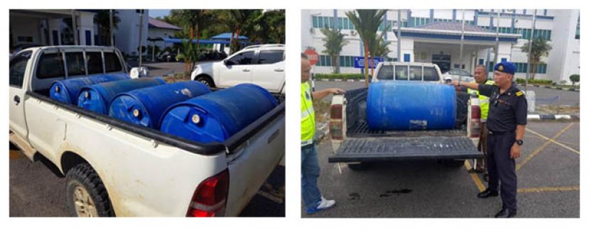  美里水警扣押皮卡车司机和桶装柴油。(左右图)