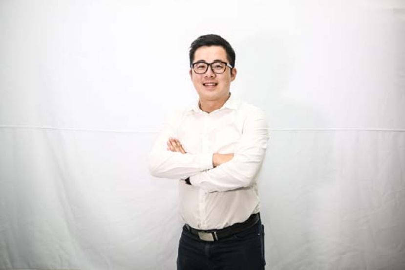 古晋社青团秘书陈祥智。