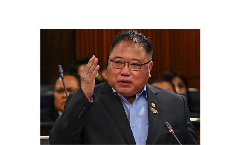 拿督斯里张庆信。