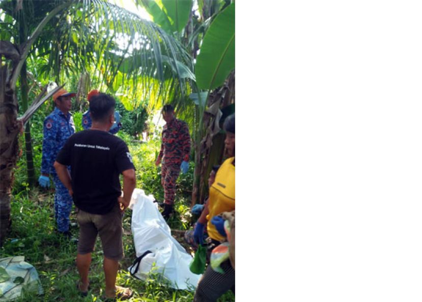  疑遭毒蛇咬死的中年汉在菜园附近被搜救人员寻获。