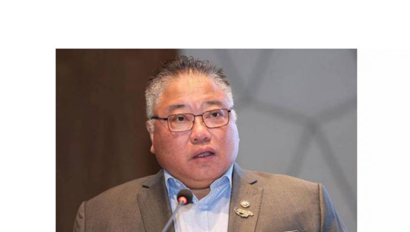 拿督斯里张庆信。