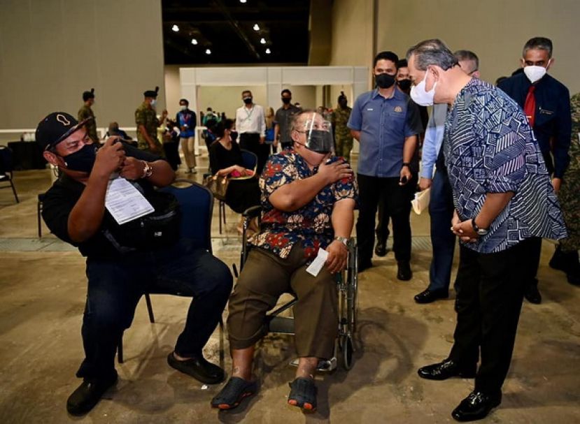 首相丹斯里慕尤丁建议落实自动化登记接种疫苗，以确保更多民众可以接种疫苗。