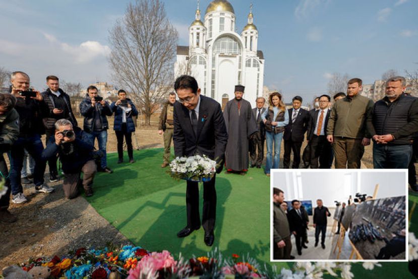 岸田文雄抵基辅并走访布查。小图为乌克兰人员向岸田文雄解说布查惨案。