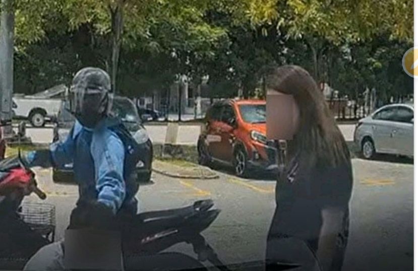 摩哆骑士制造假车祸抢金链