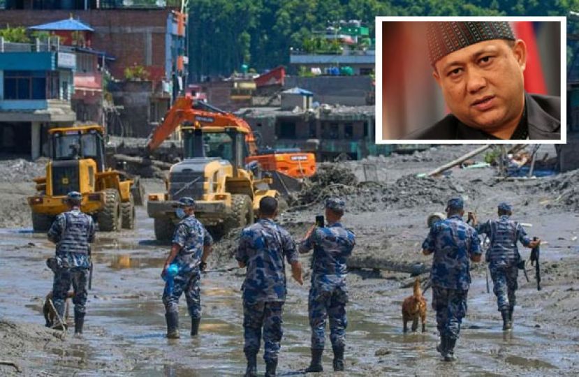 尼泊尔毁灭性洪灾已造成超过1300人死亡、5500多人失踪。小图为尼泊尔外交部长坎乃尔。