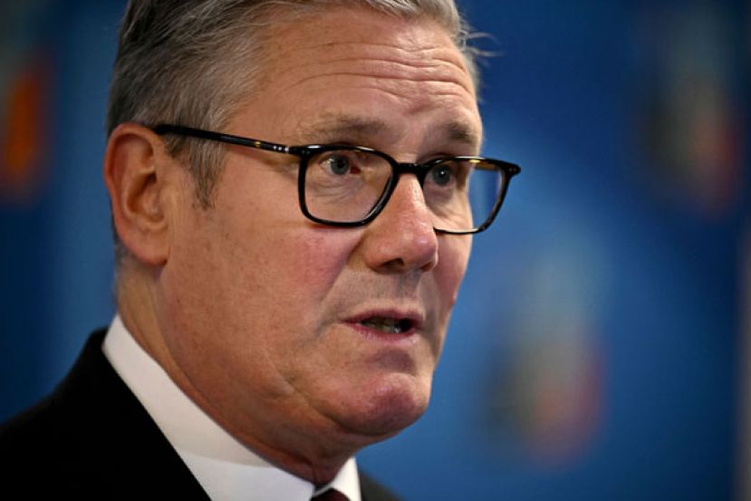 英国首相施凯尔。