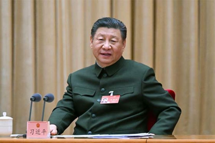 习近平出席十四届中国人大二次会议解放军和武警部队代表团全体会议。