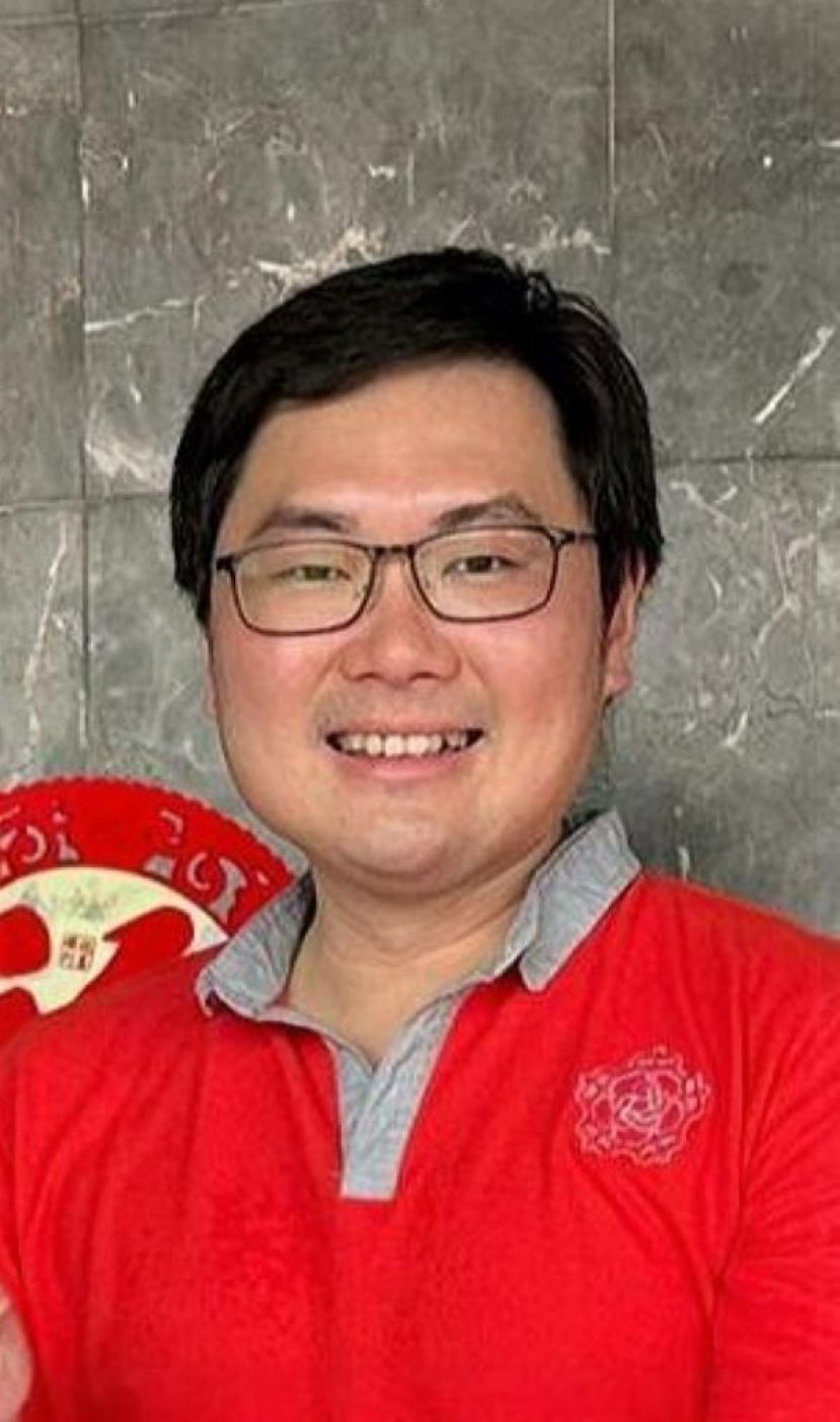 砂人联党古晋支部代秘书兼青年团团长黄笃荣。