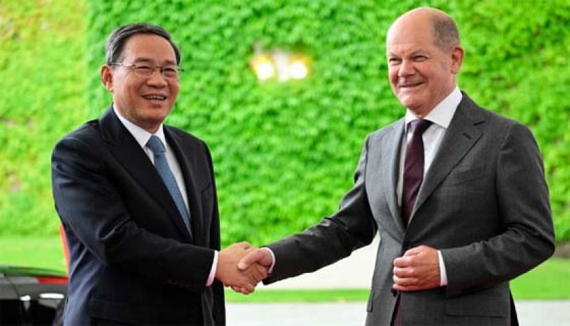 李强在柏林与德国总统史坦麦尔会面。