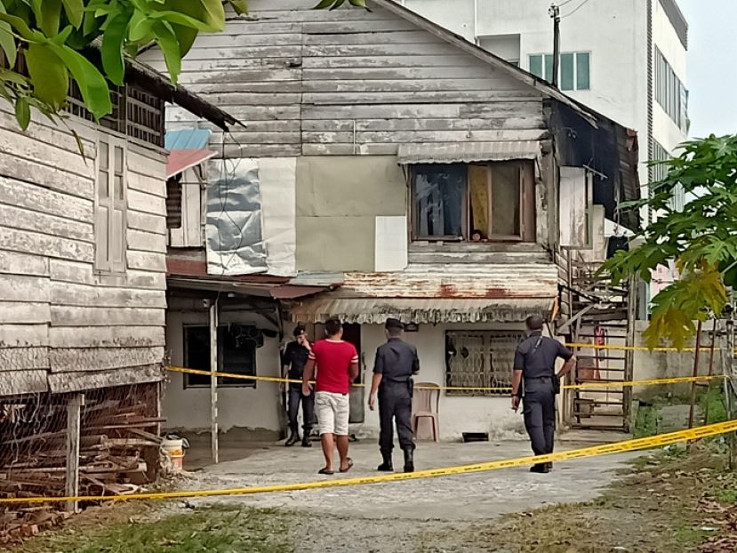 命案现场，警方正展开调查。