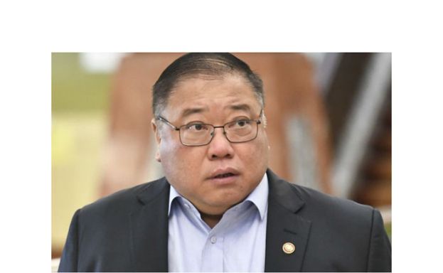 拿督斯里张庆信。