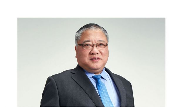 拿督斯里张庆信。