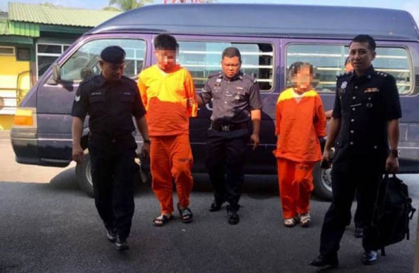 男女嫌犯出庭时摄。  &nbsp;