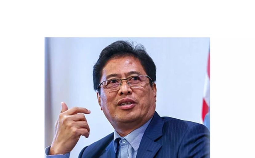 丹斯里阿占巴基。