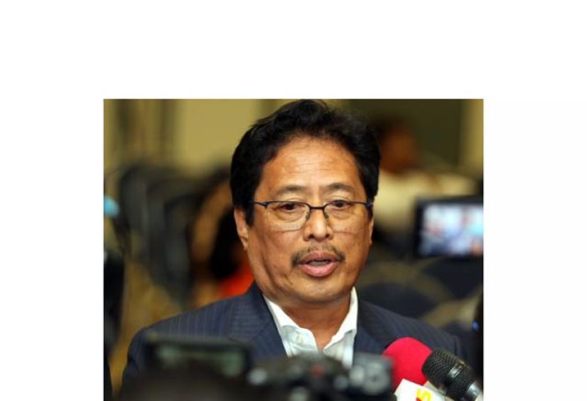 丹斯里阿占巴基。