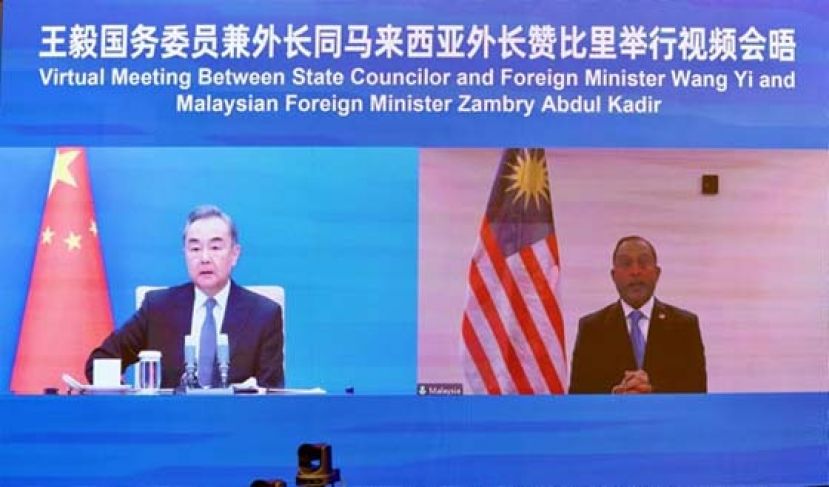  外长与王毅视讯会晤，愿加强来往深化合作。