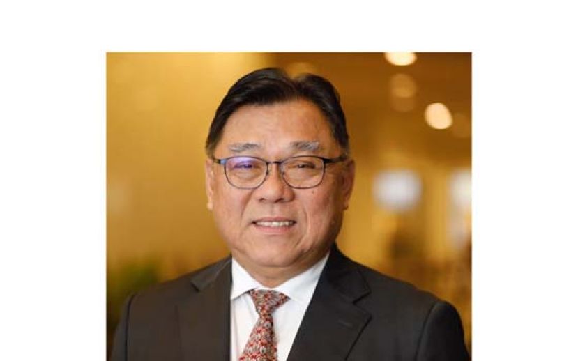 丹绒巴都区州议员周政新。