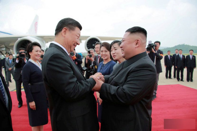 金正恩与习近平互致新年贺电。