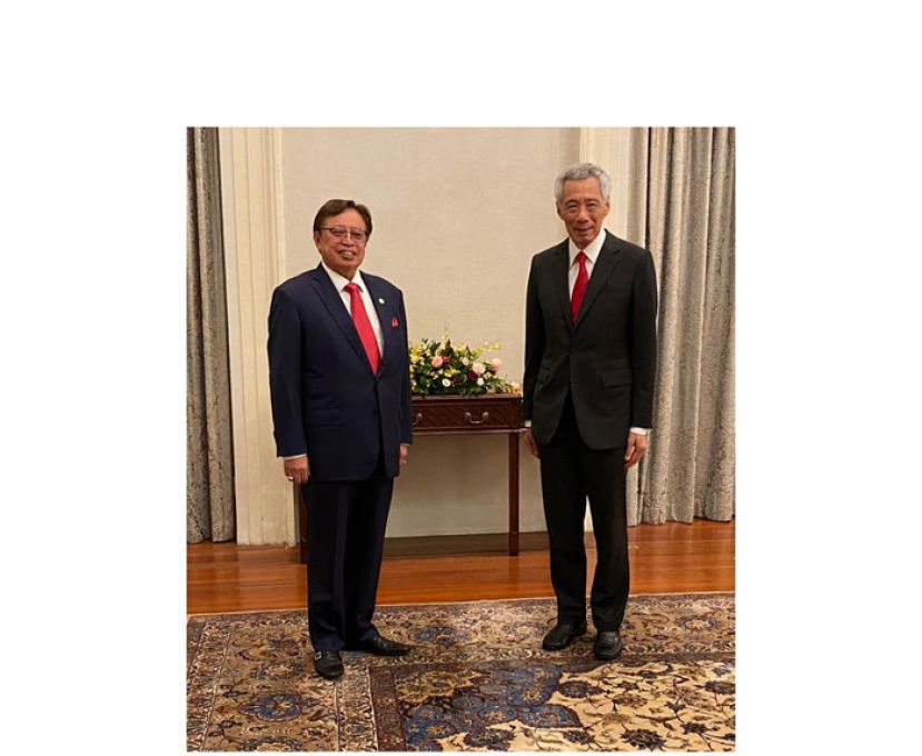 砂总理拿督巴丁宜阿邦佐哈里与新加坡总理李显龙见面。
