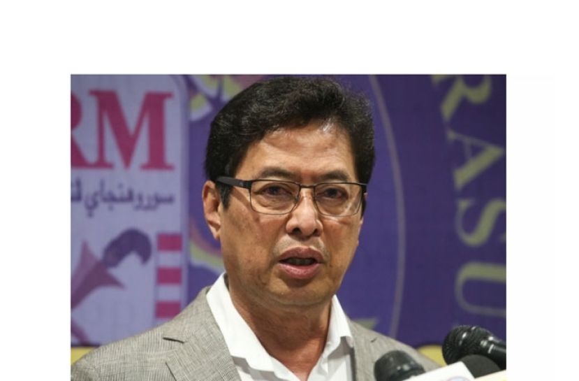 丹斯里阿占巴基。