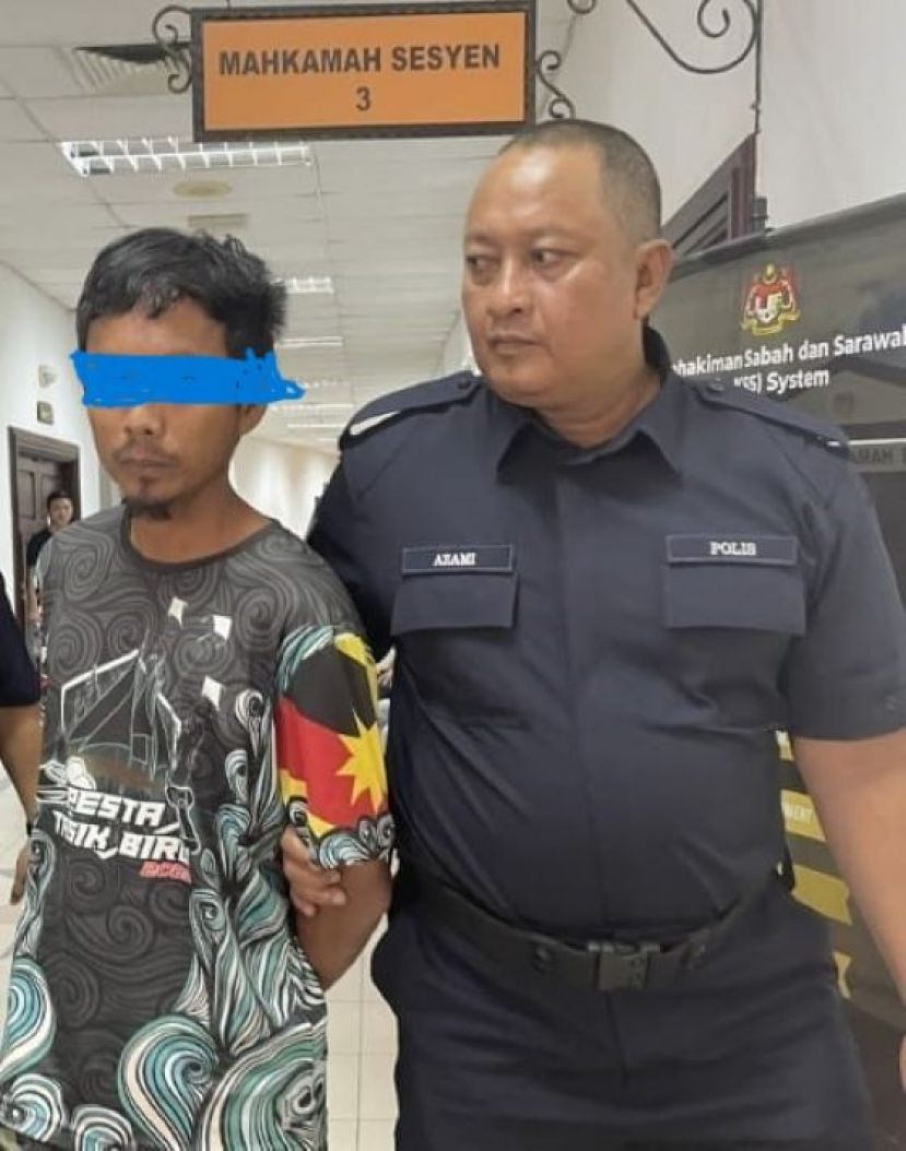 男子被押离法庭时影。