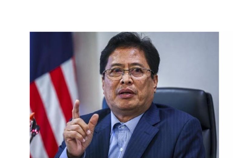 丹斯里阿占巴基。